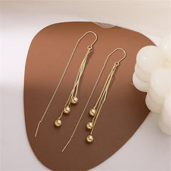Elegant 18K gold-plated threader earrings featuring two stylish beaded balls for a chic, modern look.
