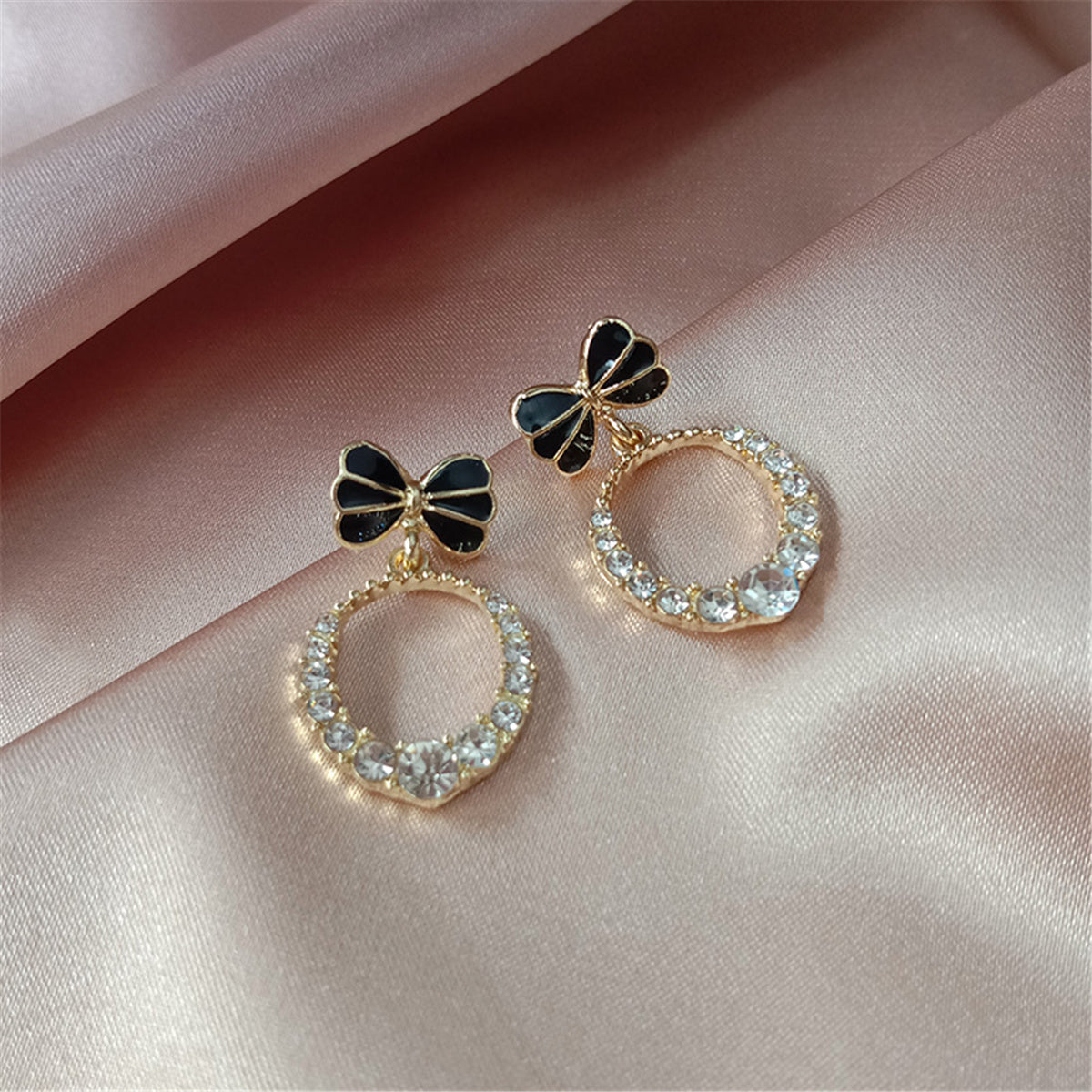 Cubic Zirconia and Black Enamel 18K Gold-Plated Bow-Accent Open Oval Drop Earrings, gold drop earrings..., detail close-up