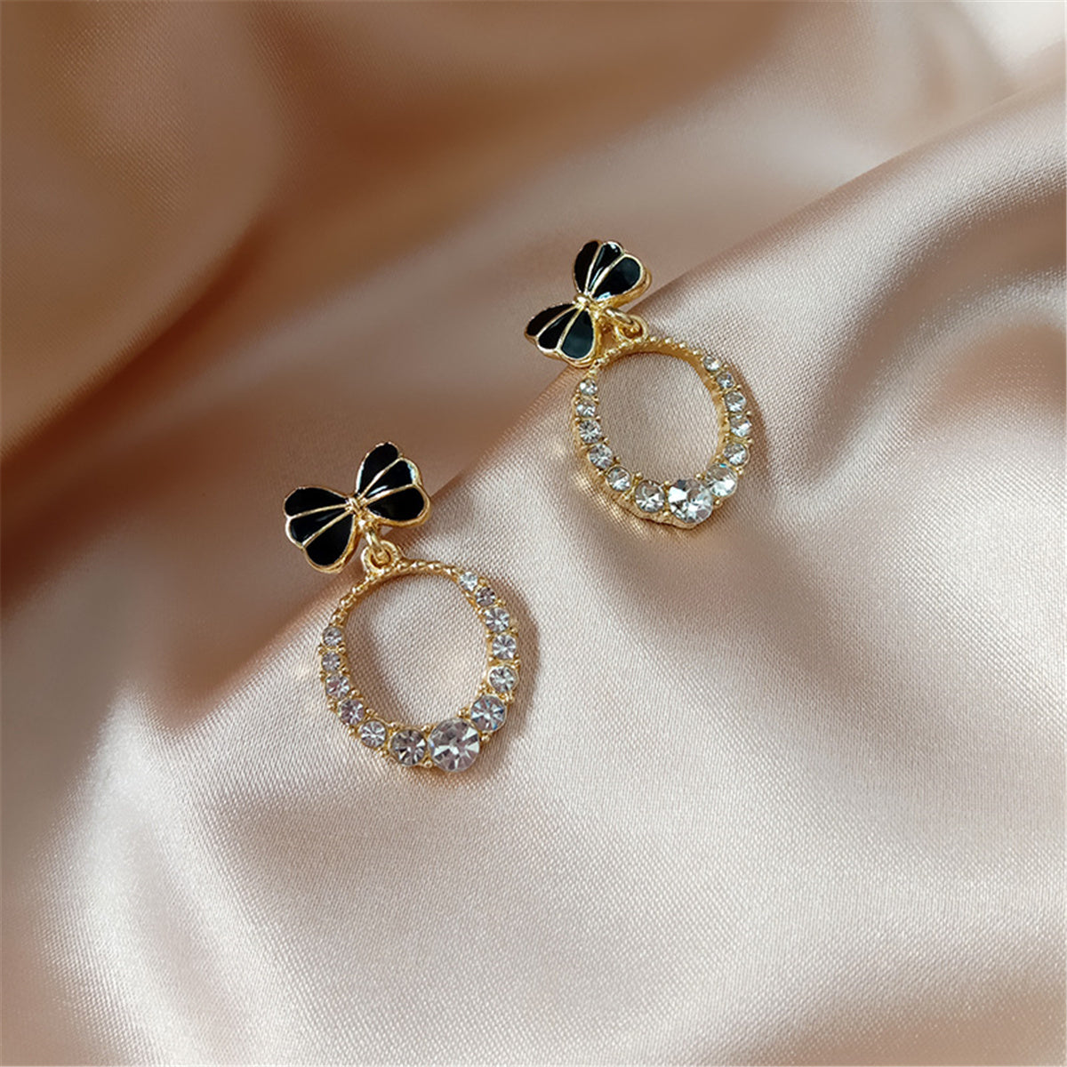 Cubic Zirconia and Black Enamel 18K Gold-Plated Bow-Accent Open Oval Drop Earrings, gold drop earrings..., lifestyle look