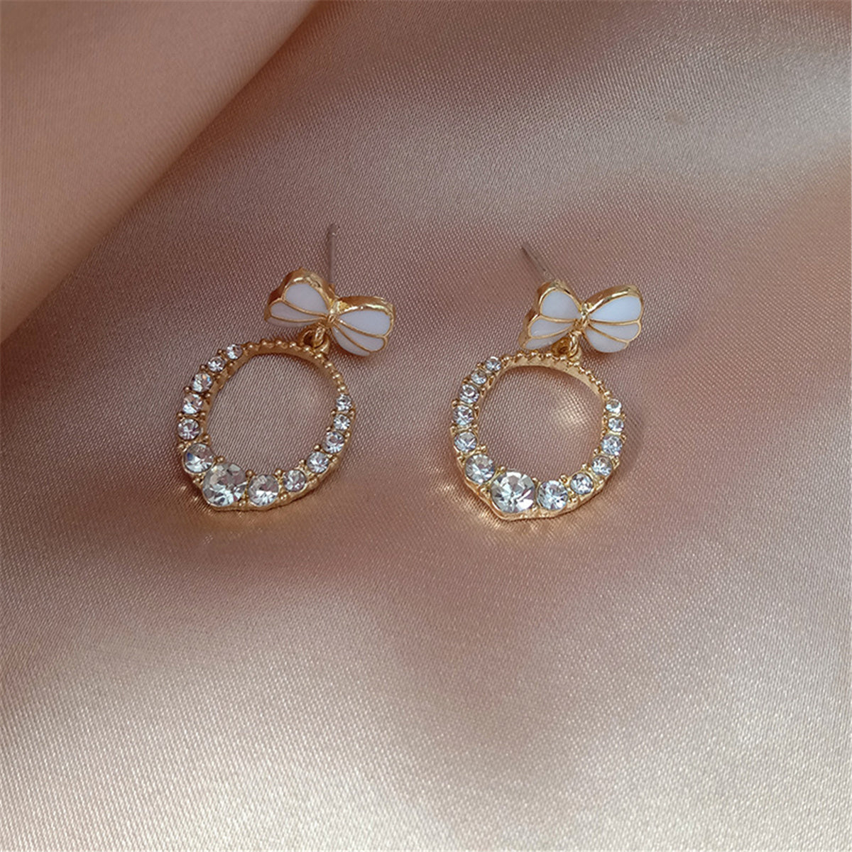Cubic Zirconia and Enamel 18K Gold-Plated Bow-Accent Open Oval Drop Earrings, gold drop earrings for women, detail close-up