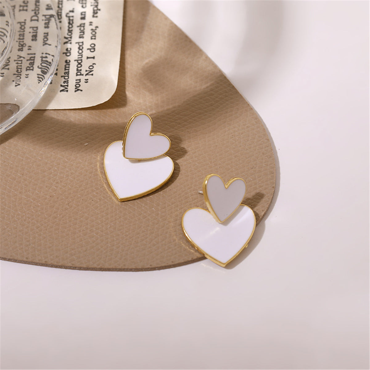 White Enamel and 18K Gold-Plated Heart Ear Jackets, gold drop earrings for women, dainty minimalist design, detail close-up
