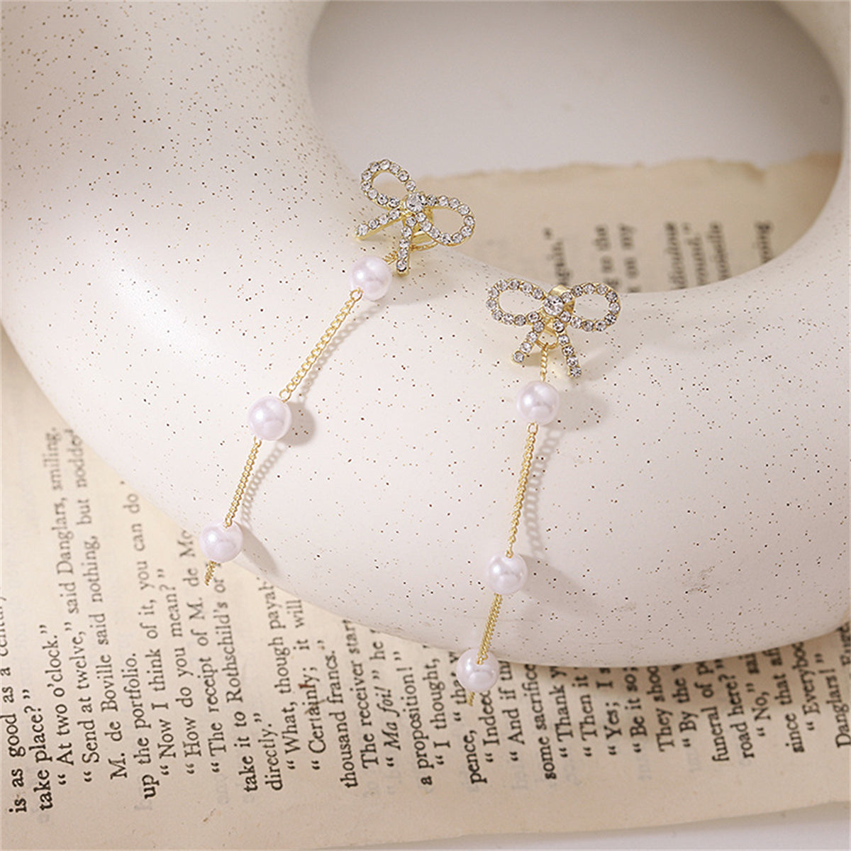 Cubic Zirconia and Pearl 18K Gold-Plated Bow Dangle Ear Jackets, gold drop earrings for women, everyday style, side view