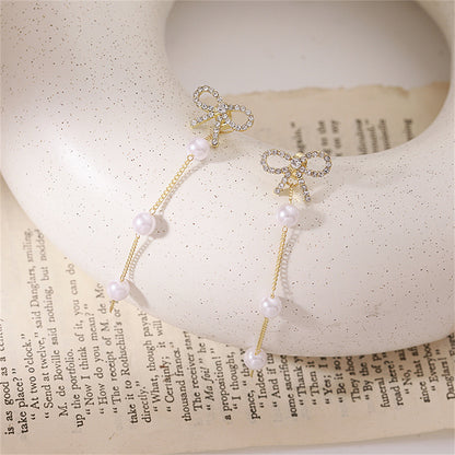 Cubic Zirconia and Pearl 18K Gold-Plated Bow Dangle Ear Jackets, gold drop earrings for women, everyday style, side view