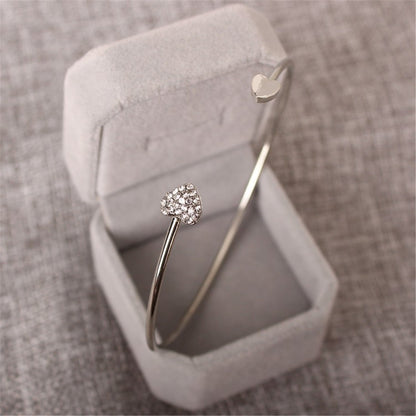 Cubic Zirconia and Silver-Plated Heart Cuff, silver bracelet for women, dainty minimalist design, front view