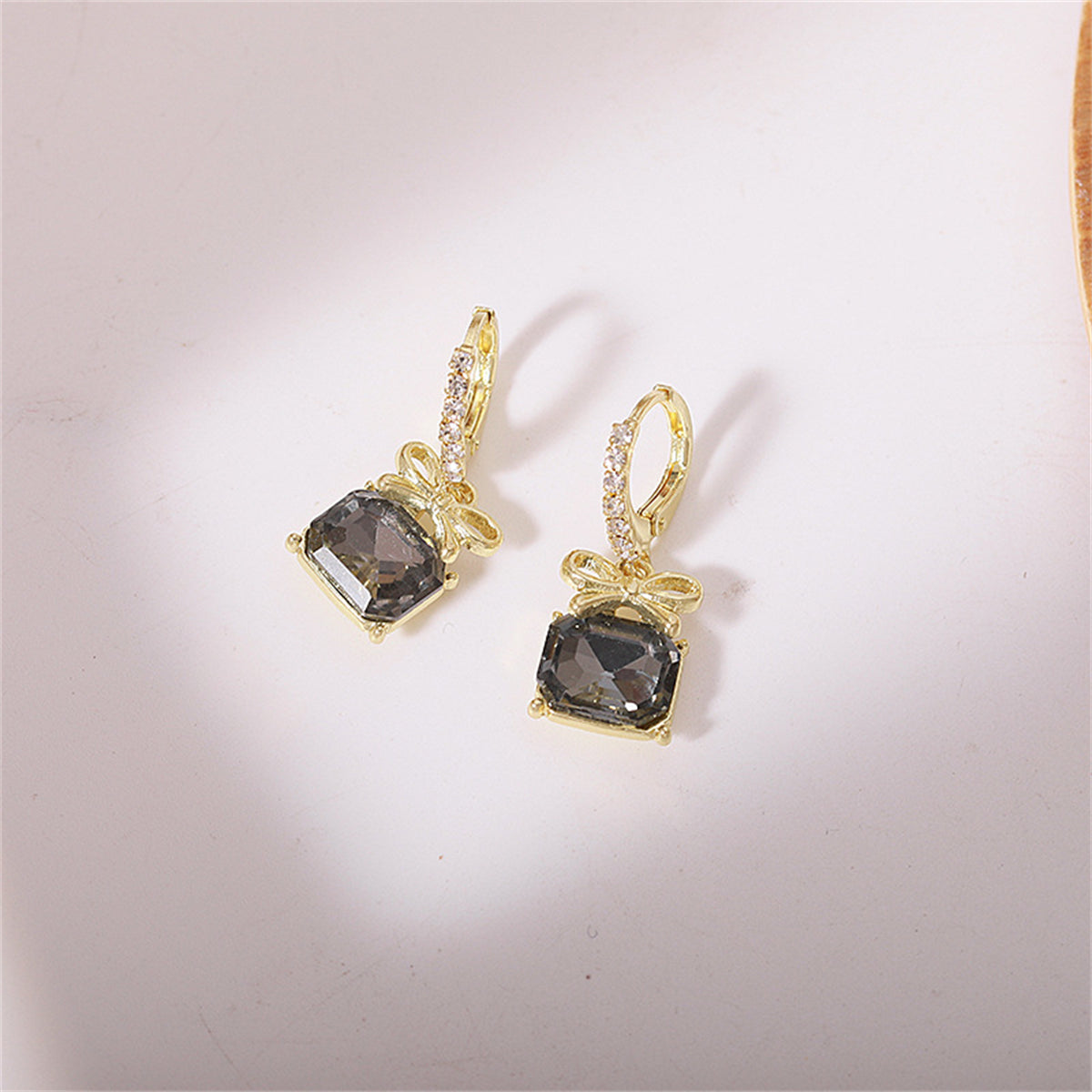 Green Crystal and Cubic Zirconia Bow Huggie Earrings, huggie earrings, vintage-inspired design, lifestyle look