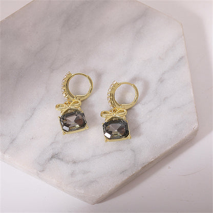 Green Crystal and Cubic Zirconia Bow Huggie Earrings, huggie earrings, vintage-inspired design, styled look
