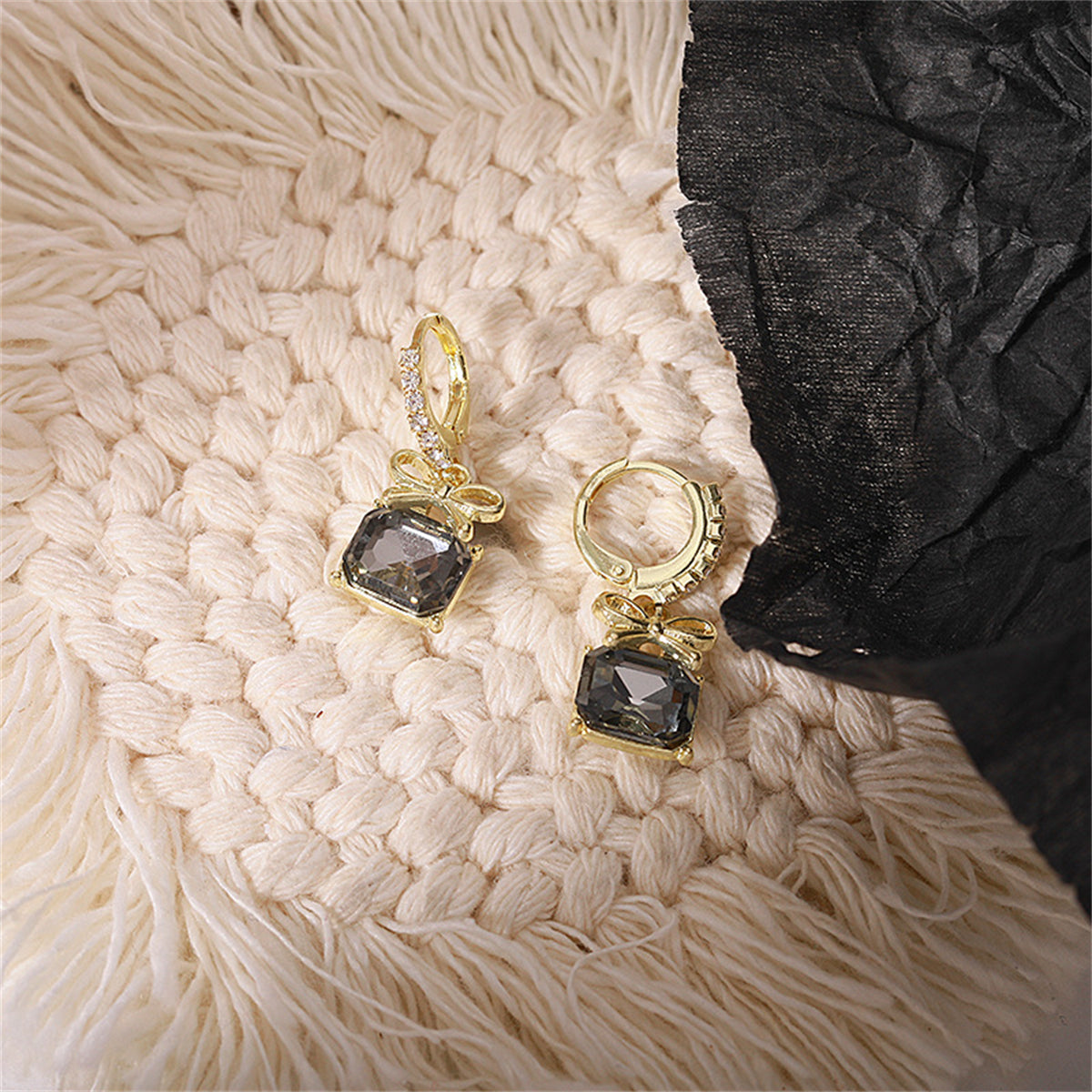 Green Crystal and Cubic Zirconia Bow Huggie Earrings, huggie earrings, vintage-inspired design, detail close-up