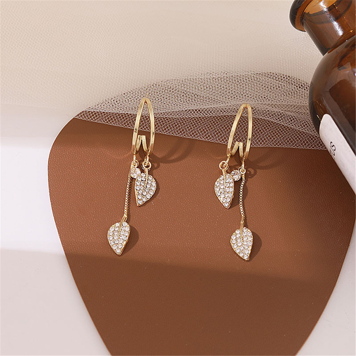 Cubic Zirconia and 18K Gold-Plated Leaves Huggie Earrings, gold huggie earrings, elegant gift for her, lifestyle look