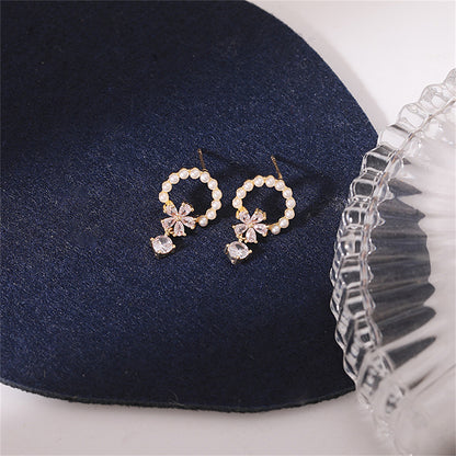 Crystal and Pearl 18K Gold-Plated Flower Drop Earrings, gold drop earrings for women, botanical inspired, detail close-up