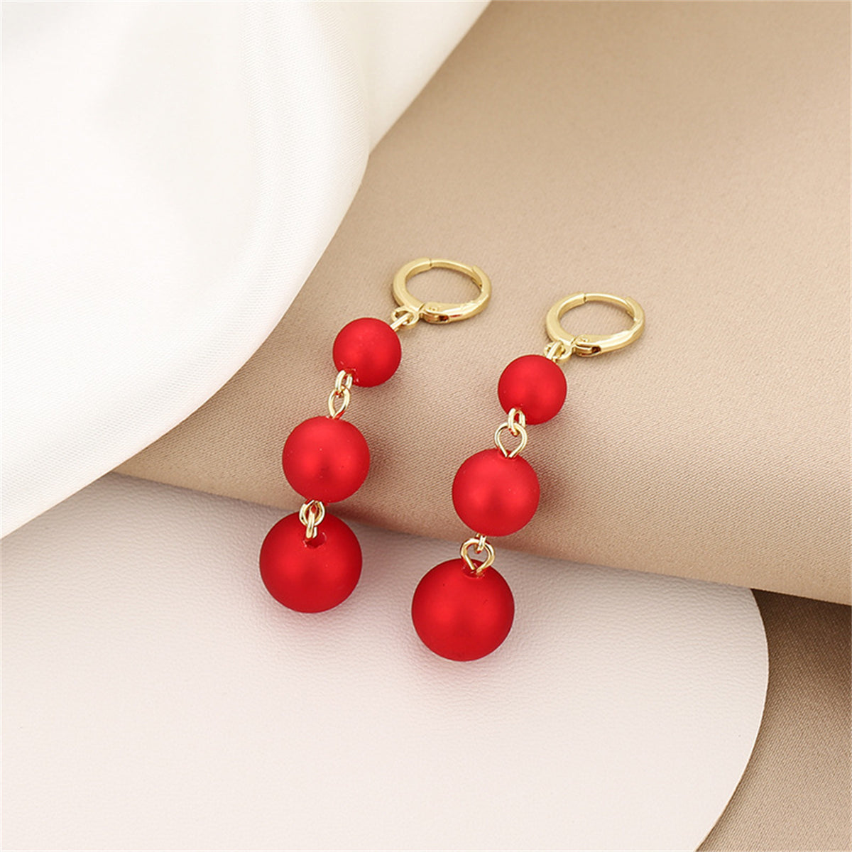 Red Frosted Resin and 18K Gold-Plated Beads Huggie Earrings, gold huggie earrings, everyday style, front view