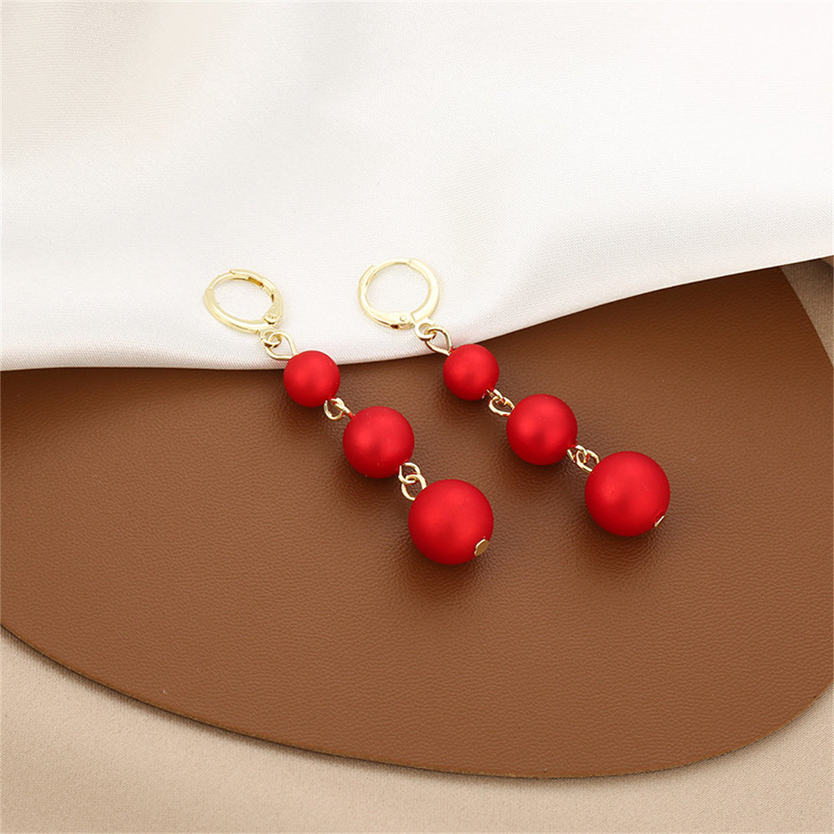 Red Frosted Resin and 18K Gold-Plated Beads Huggie Earrings, gold huggie earrings, everyday style, lifestyle look