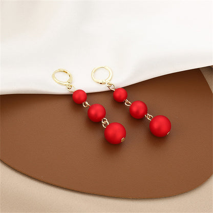 Red Frosted Resin and 18K Gold-Plated Beads Huggie Earrings, gold huggie earrings, everyday style, lifestyle look