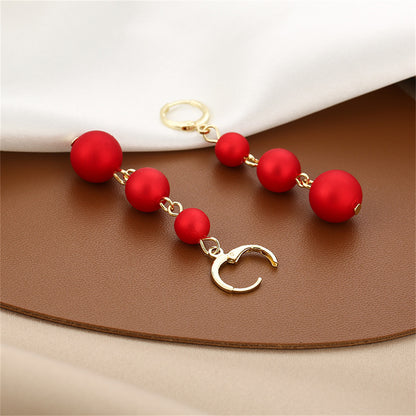 Red Frosted Resin and 18K Gold-Plated Beads Huggie Earrings, gold huggie earrings, everyday style, styled look