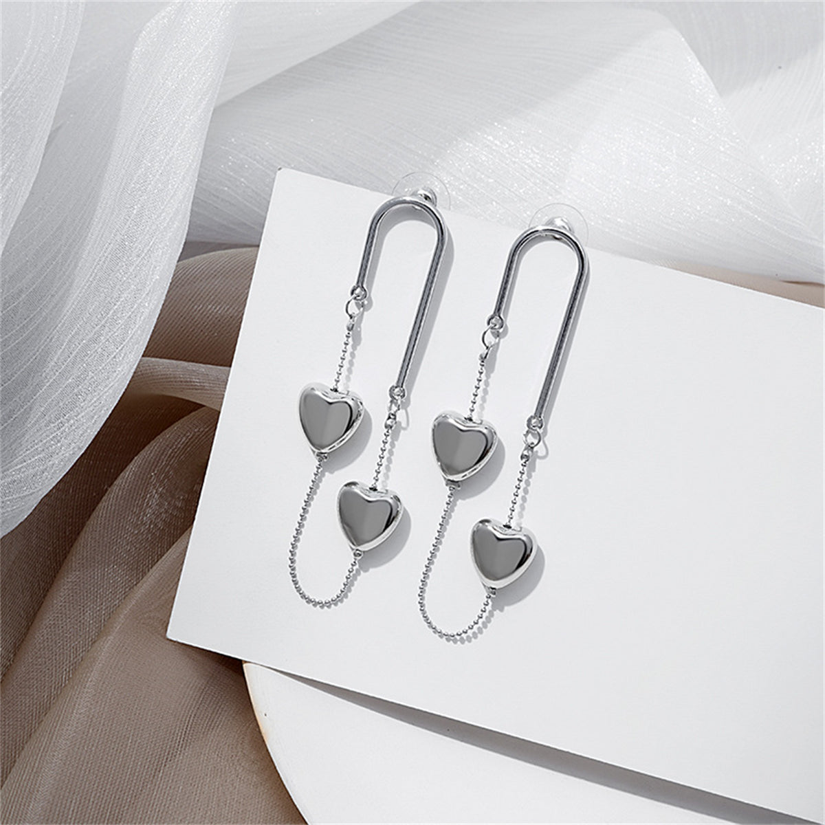 Silver-Plated Heart Chain Drop Earrings, silver drop earrings for women, vintage-inspired design, lifestyle look
