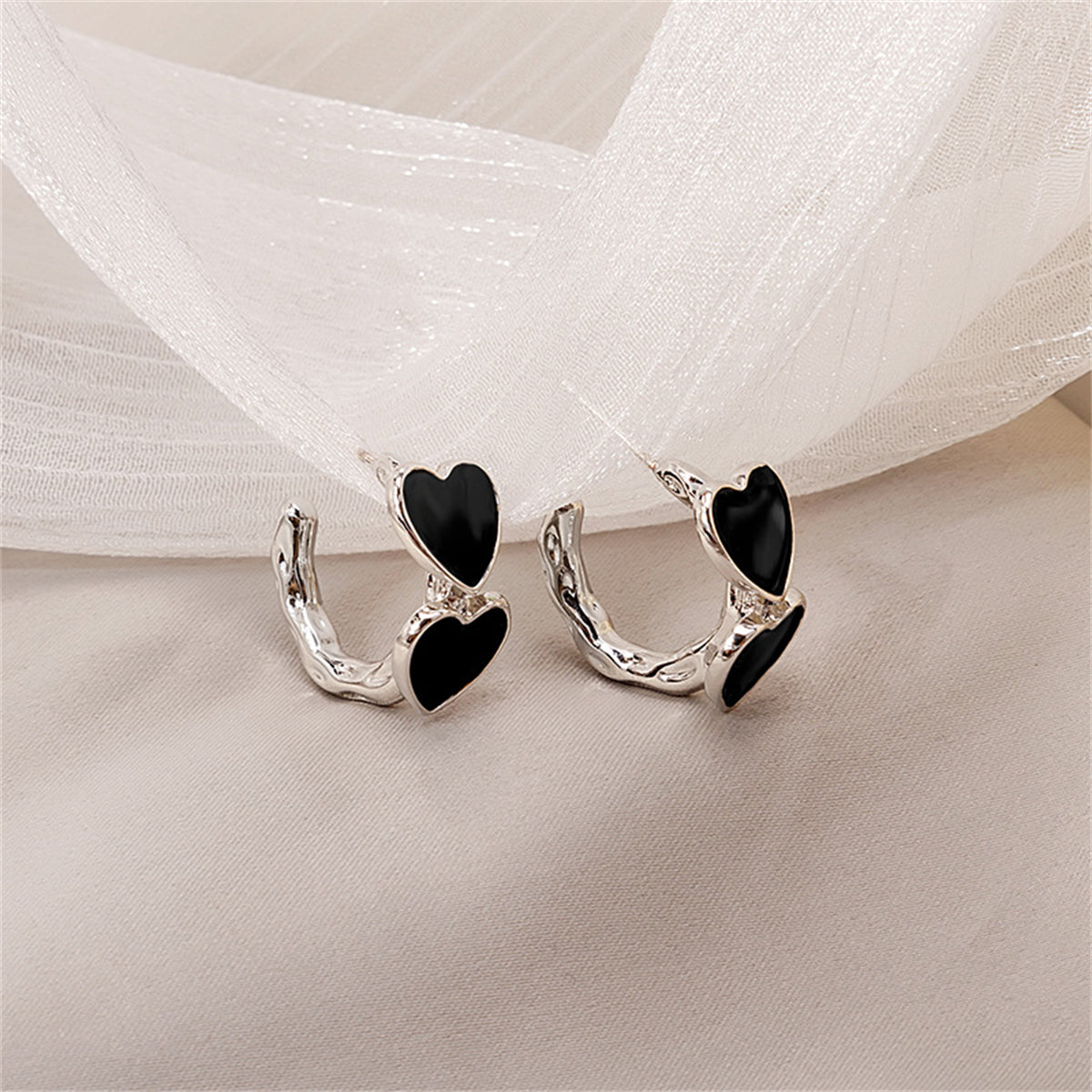 Black Enamel and Silver-Plated Heart Huggie Earrings, silver huggie earrings, elegant gift for her, front view