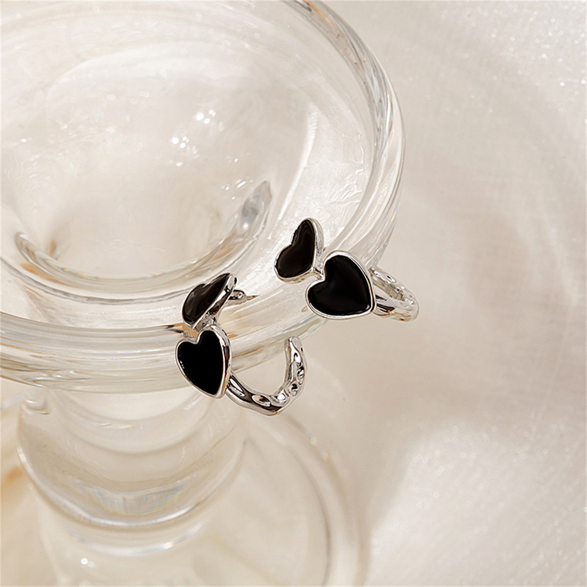 Black Enamel and Silver-Plated Heart Huggie Earrings, silver huggie earrings, elegant gift for her, detail close-up