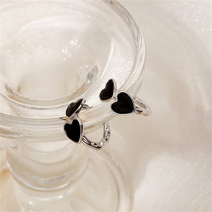 Black Enamel and Silver-Plated Heart Huggie Earrings, silver huggie earrings, elegant gift for her, detail close-up