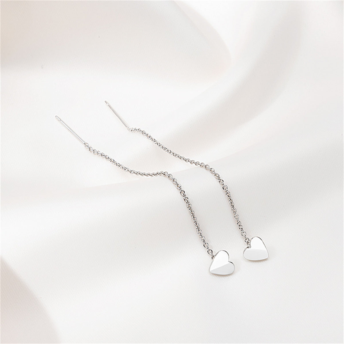 Silver-Plated Heart Threader Earrings, silver drop earrings for women, vintage-inspired design, lifestyle look