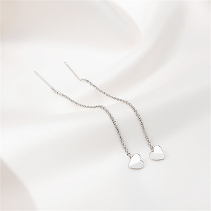 Silver-Plated Heart Threader Earrings, silver drop earrings for women, vintage-inspired design, lifestyle look