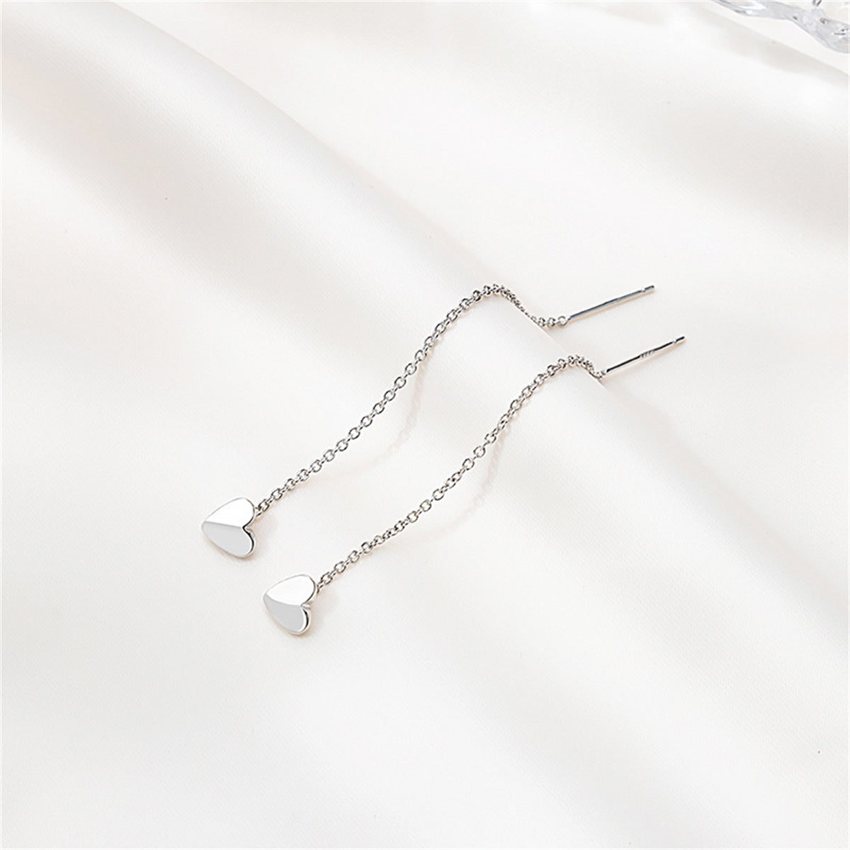 Silver-Plated Heart Threader Earrings, silver drop earrings for women, vintage-inspired design, styled look