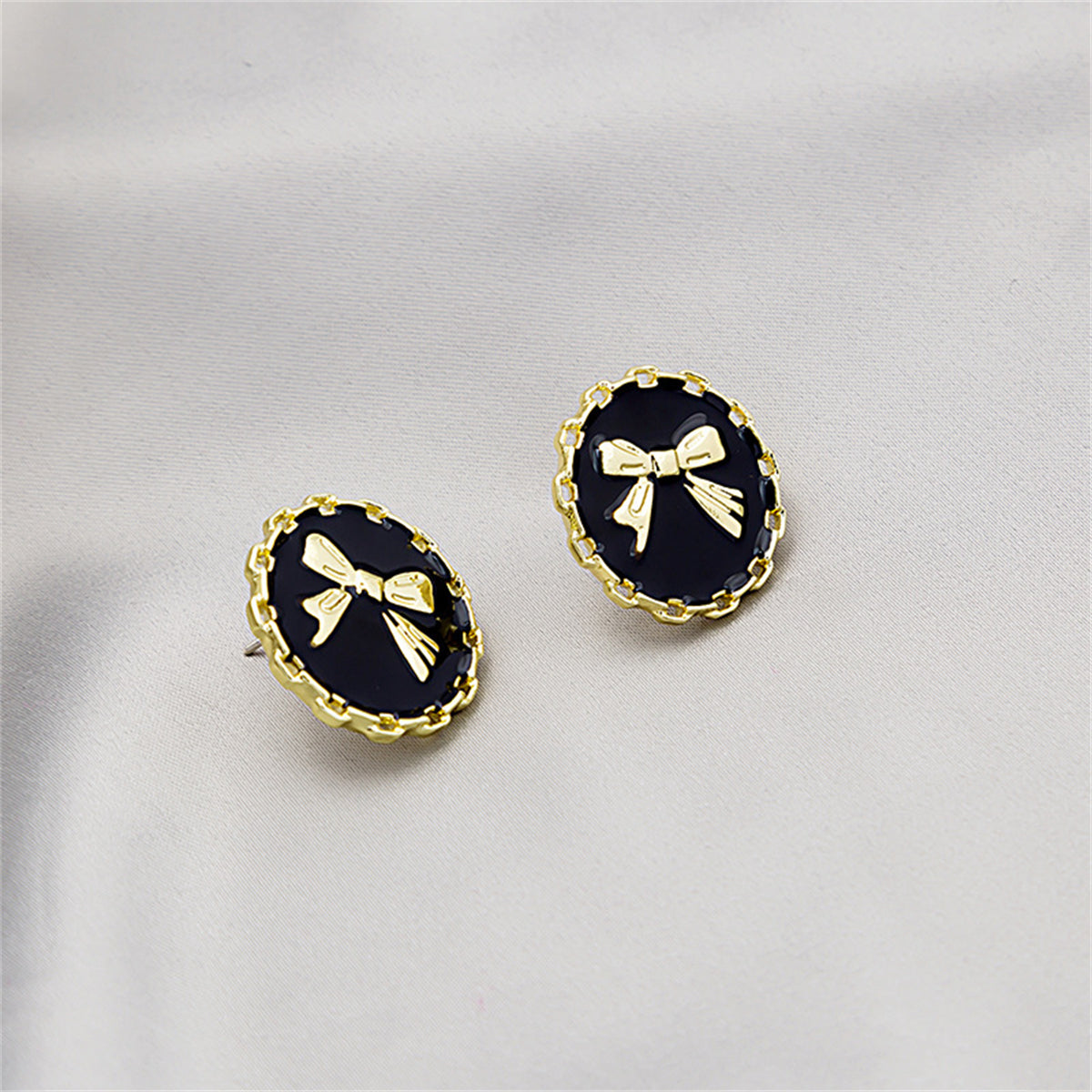Black Enamel and 18K Gold-Plated Bow Round Stud Earring, gold stud earrings for women, vintage-inspired design, side view
