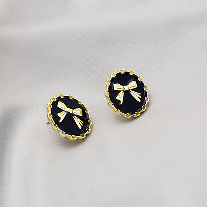 Black Enamel and 18K Gold-Plated Bow Round Stud Earring, gold stud earrings for women, vintage-inspired design, side view