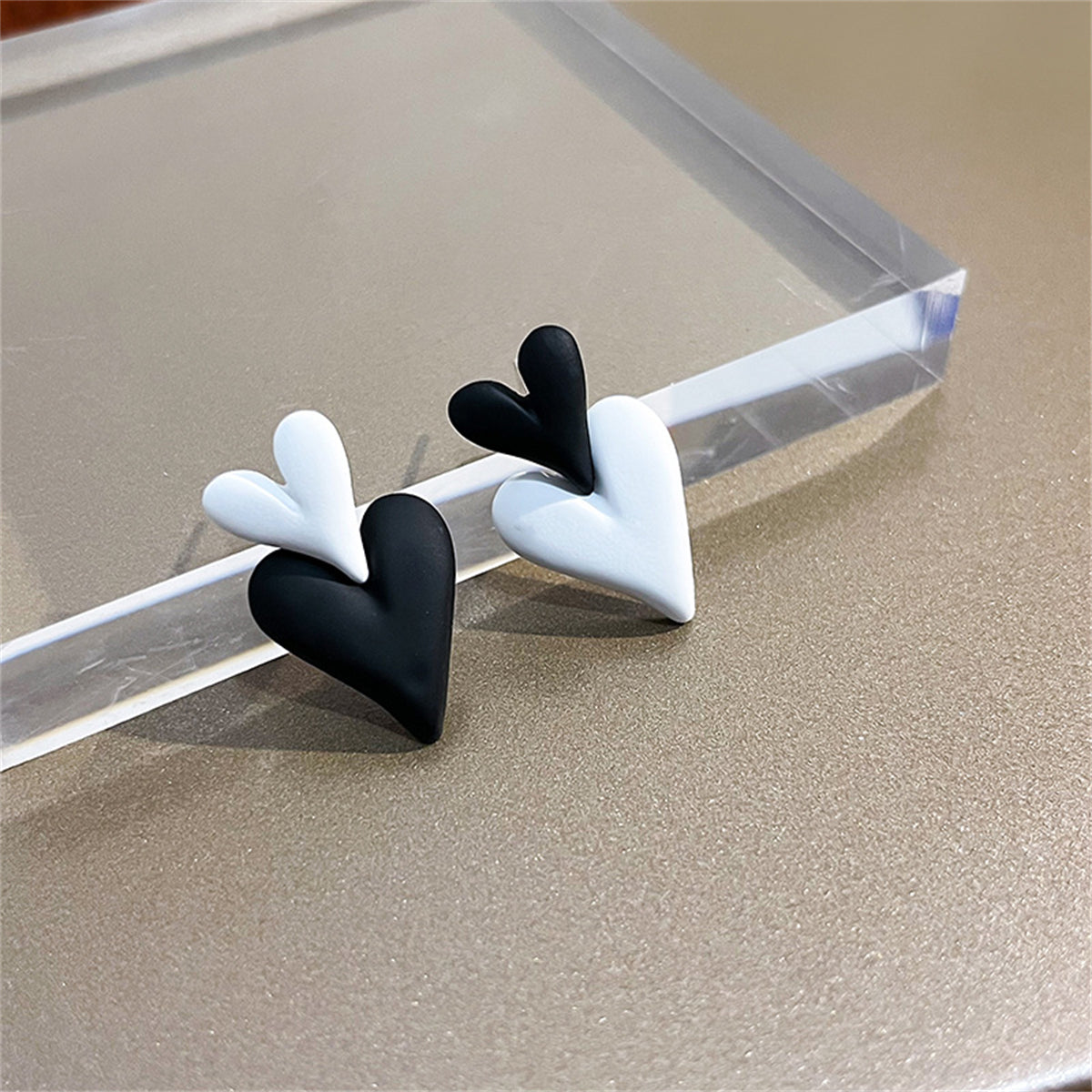 Black and White Double Heart Drop Earrings, drop earrings for women, dainty minimalist design, front view