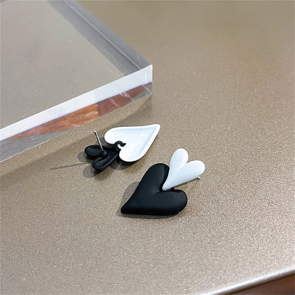 Black and White Double Heart Drop Earrings, drop earrings for women, dainty minimalist design, detail close-up