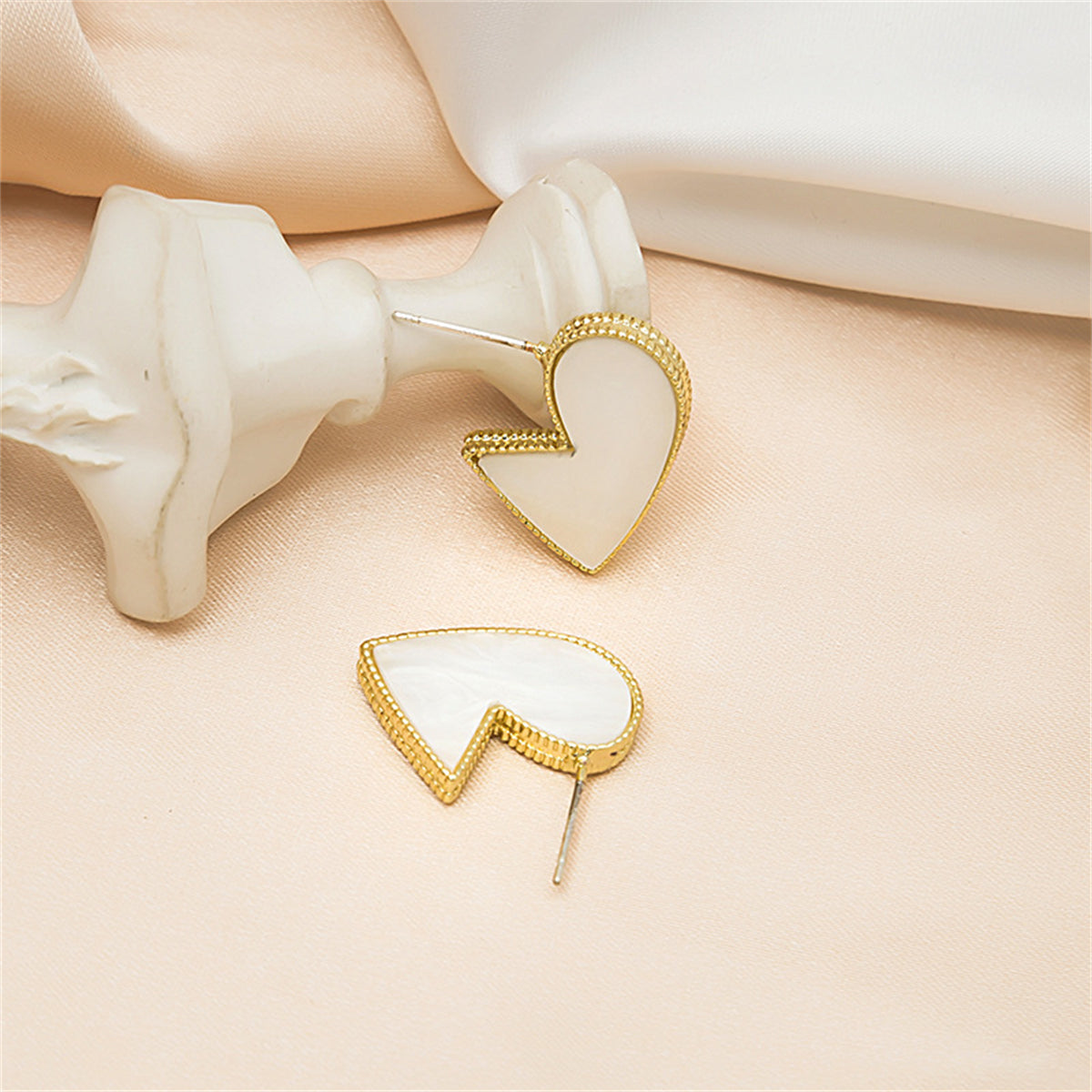 White Enamel and 18K Gold-Plated Bordered-Heart Huggie Earrings, gold huggie earrings, lifestyle look