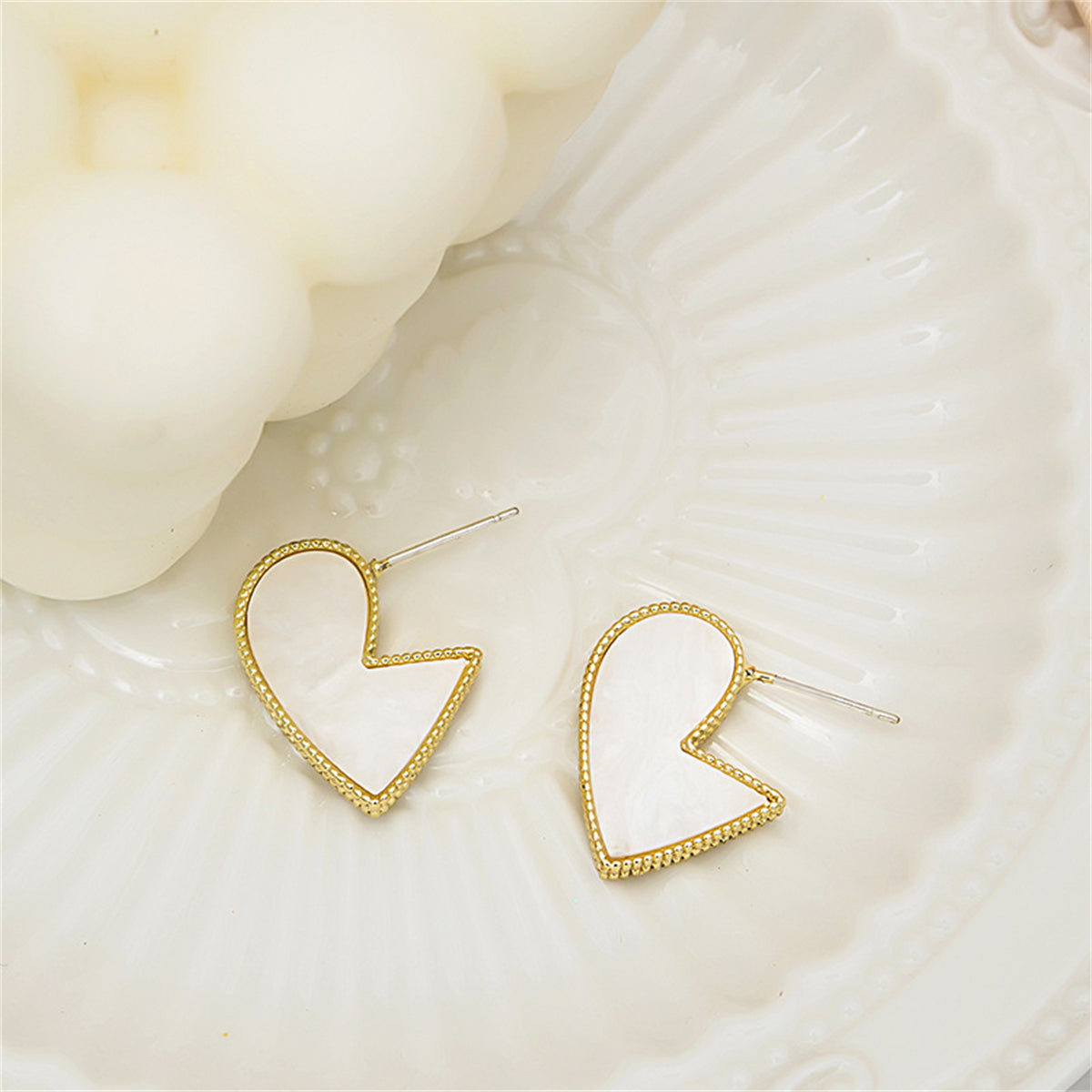 White Enamel and 18K Gold-Plated Bordered-Heart Huggie Earrings, gold huggie earrings, vintage-inspired design, front view