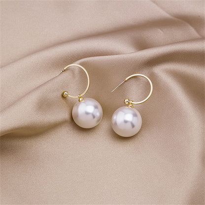 Pearl and 18K Gold-Plated Huggie Earrings, gold huggie earrings, everyday style, front view