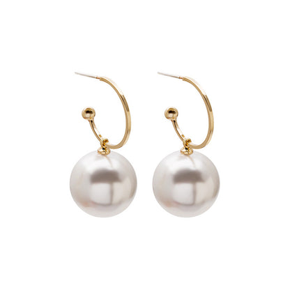 Pearl and 18K Gold-Plated Huggie Earrings, gold huggie earrings, everyday style, side view