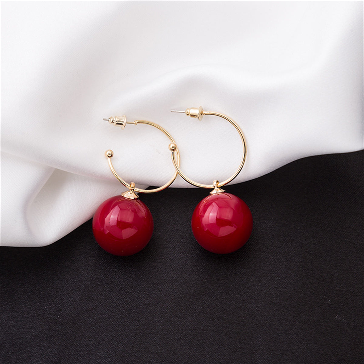 Red Pearl and 18K Gold-Plated Huggie Earrings, gold huggie earrings, dainty minimalist design, front view