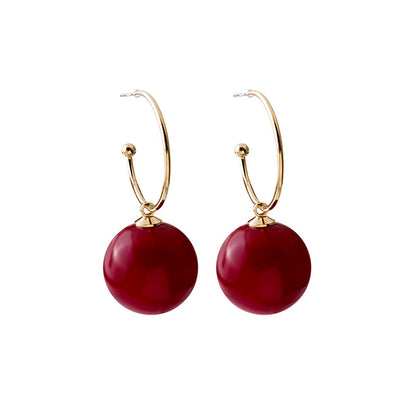 Red Pearl and 18K Gold-Plated Huggie Earrings, gold huggie earrings, dainty minimalist design, side view