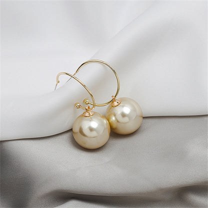 Champagne Pearl and 18K Gold-Plated Huggie Earrings, gold huggie earrings, dainty minimalist design, front view