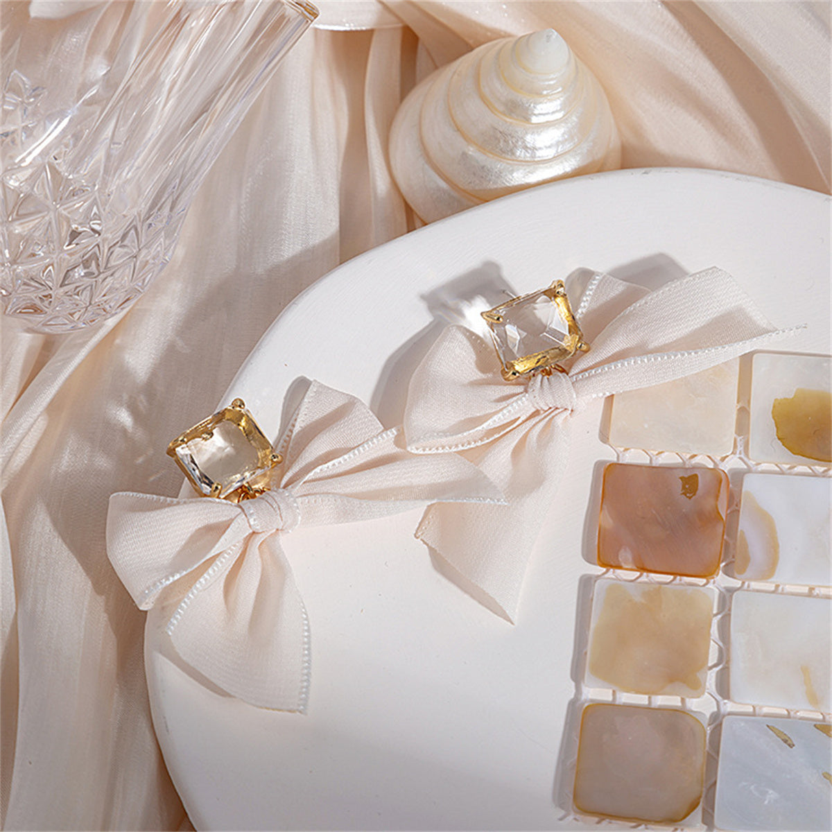 Crystal and Polyster 18K Gold-Plated Bow Drop Earrings, gold drop earrings for women, botanical inspired, detail close-up