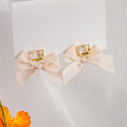 Crystal and Polyster 18K Gold-Plated Bow Drop Earrings, gold drop earrings for women, botanical inspired, lifestyle look