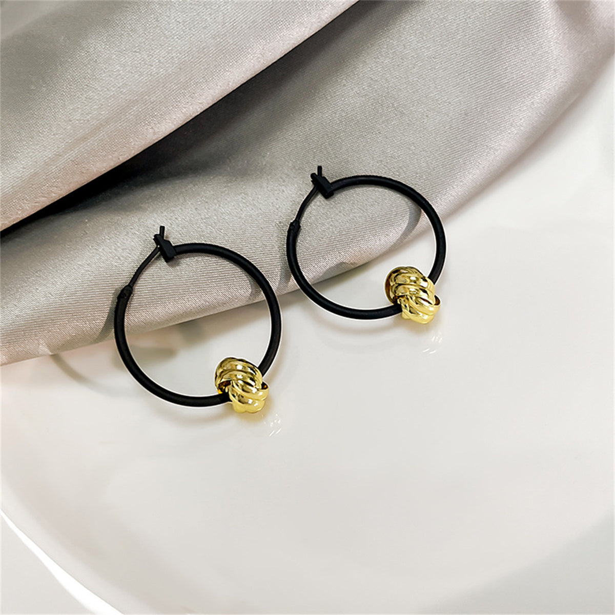 Black and 18K Gold-Plated Ball Hoop Earrings, botanical inspired, side view