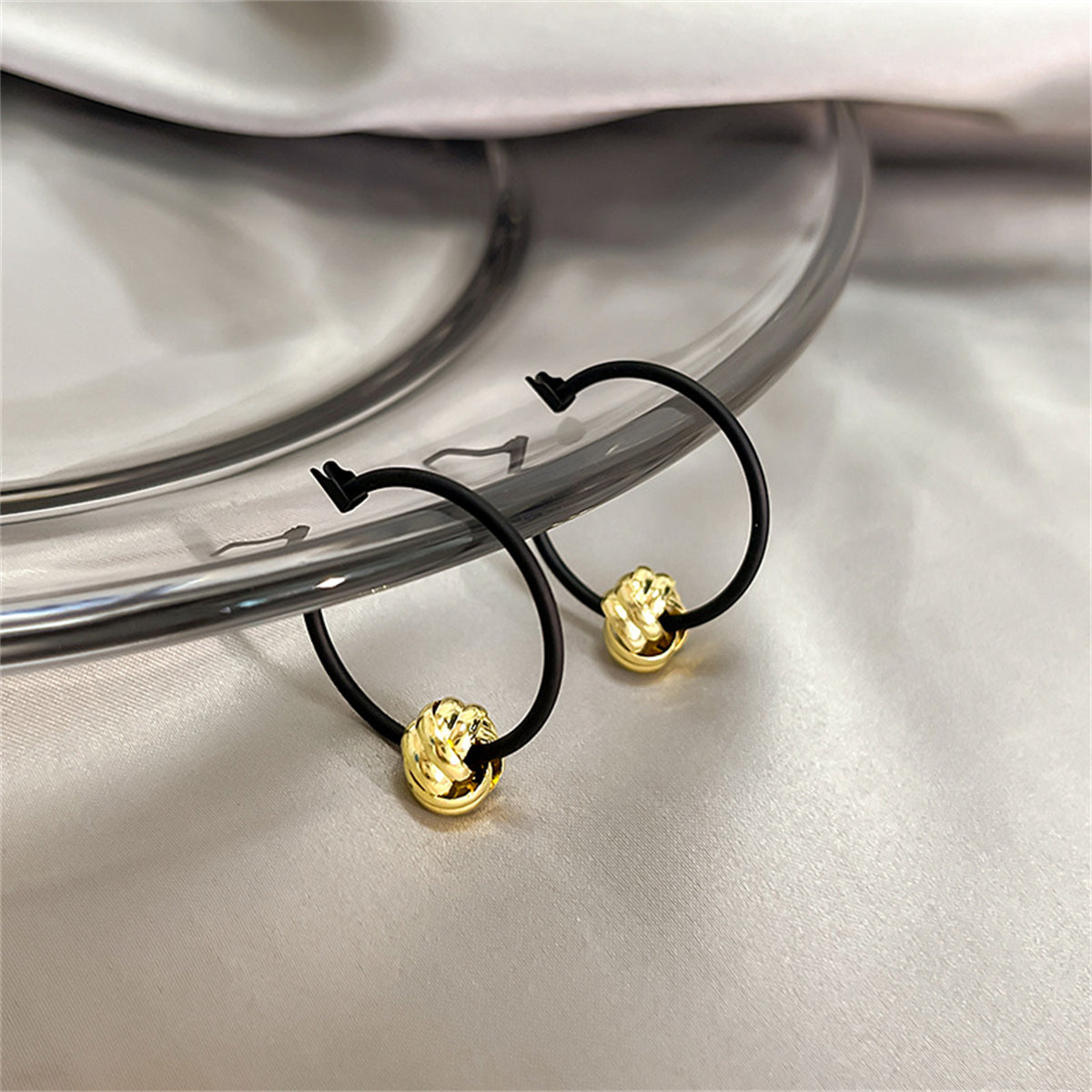 Black and 18K Gold-Plated Ball Hoop Earrings, botanical inspired, detail close-up