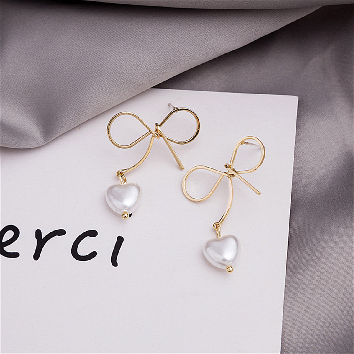 Pearl and 18K Gold-Plated Bow and Heart Drop Earrings, gold drop earrings for women, vintage-inspired design, front view