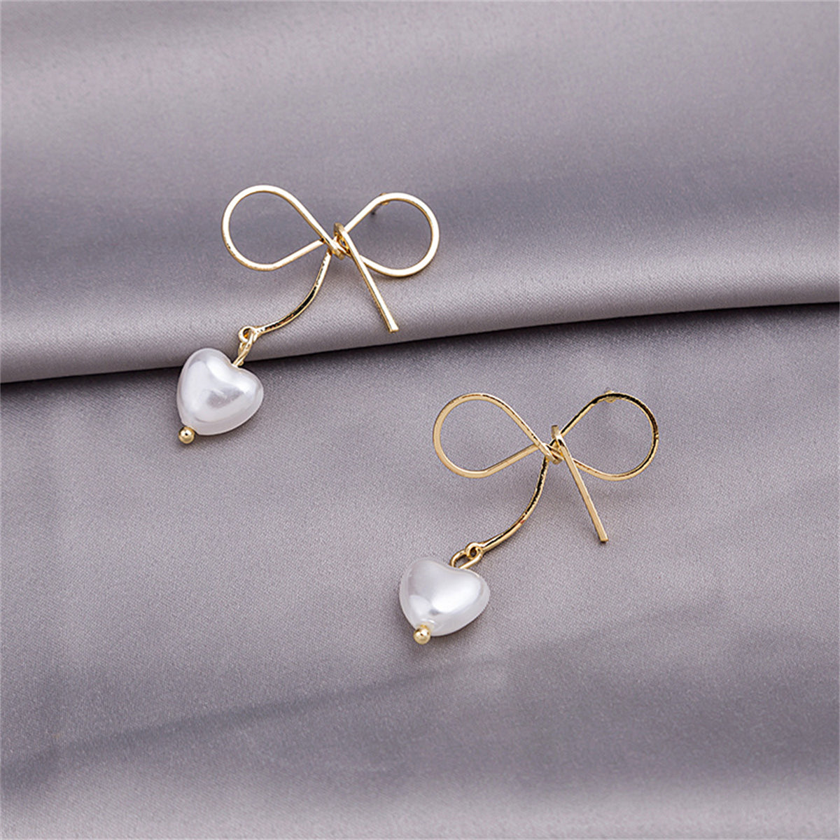 Pearl and 18K Gold-Plated Bow and Heart Drop Earrings, gold drop earrings for women, vintage-inspired design, side view