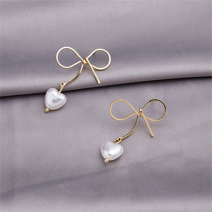 Pearl and 18K Gold-Plated Bow and Heart Drop Earrings, gold drop earrings for women, vintage-inspired design, side view