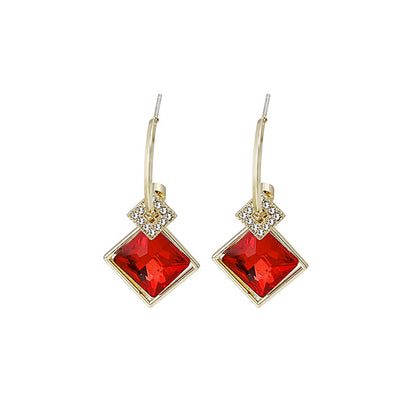 Red Princess Crystal and Clear Cubic Zirconia Huggie Earrings, huggie earrings, botanical inspired, front view