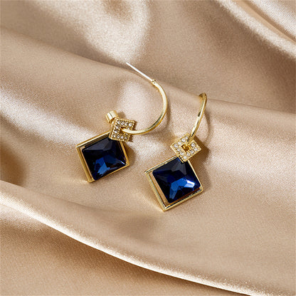 Blue Princess Crystal and Cubic Zirconia Huggie Earrings, huggie earrings, botanical inspired, side view