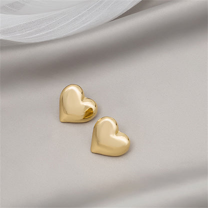 18K Gold-Plated Heart Stud Earrings, gold stud earrings for women, dainty minimalist design, lifestyle look