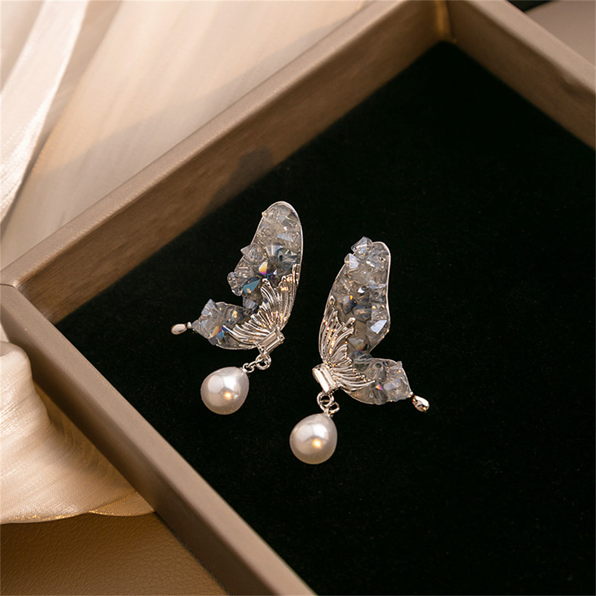 Pearl and Crystal Silver-Plated Butterfly Drop Earrings, silver drop earrings for women, botanical inspired, detail close-up