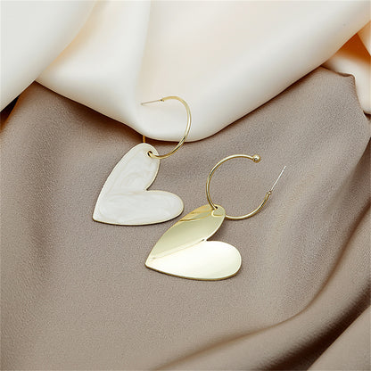 White Enamel and 18K Gold-Plated Heart Huggie Earrings, gold huggie earrings, dainty minimalist design, front view