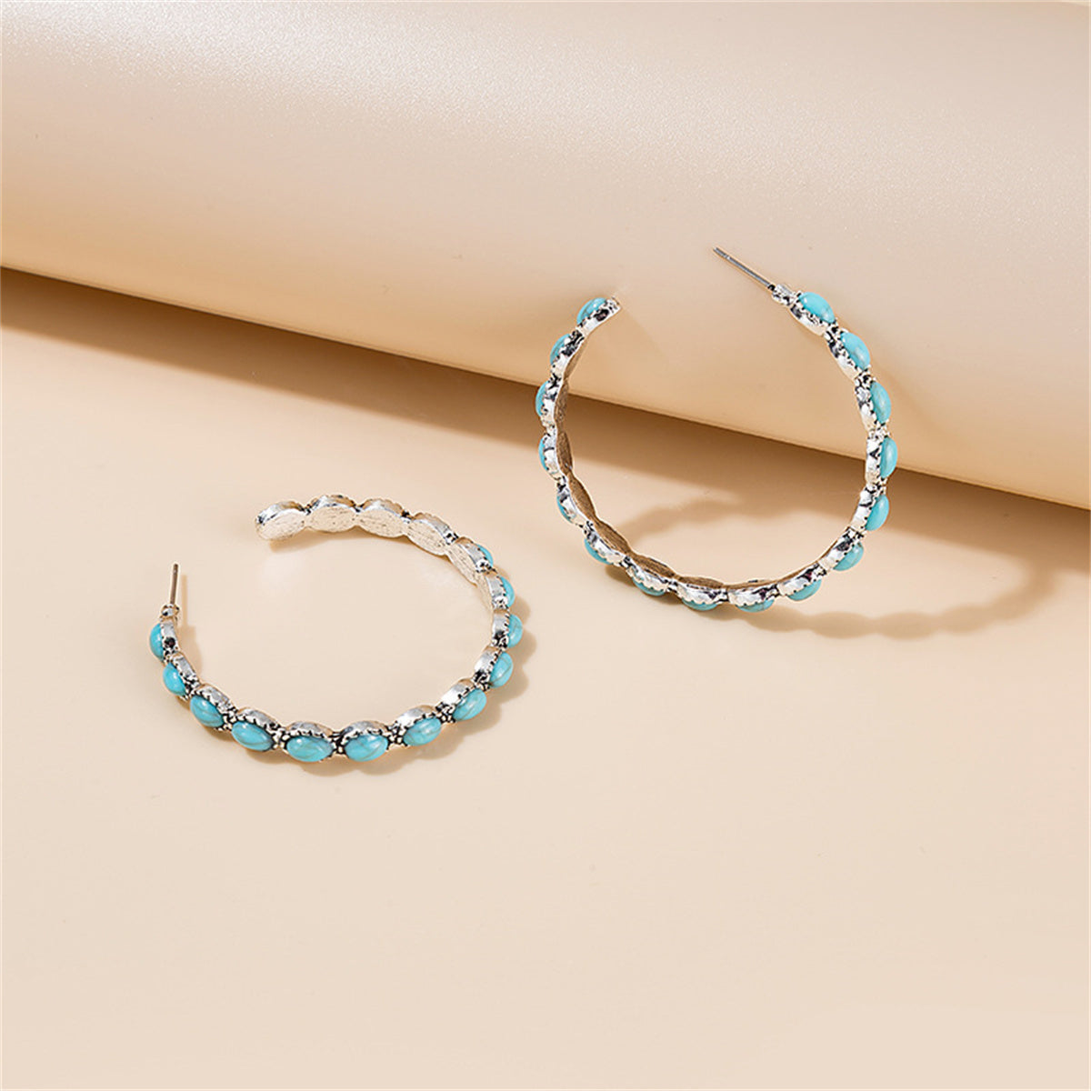 Blue Turquoise and Silver-Plated Oval-Cut Hoop Earrings, vintage-inspired design, front view
