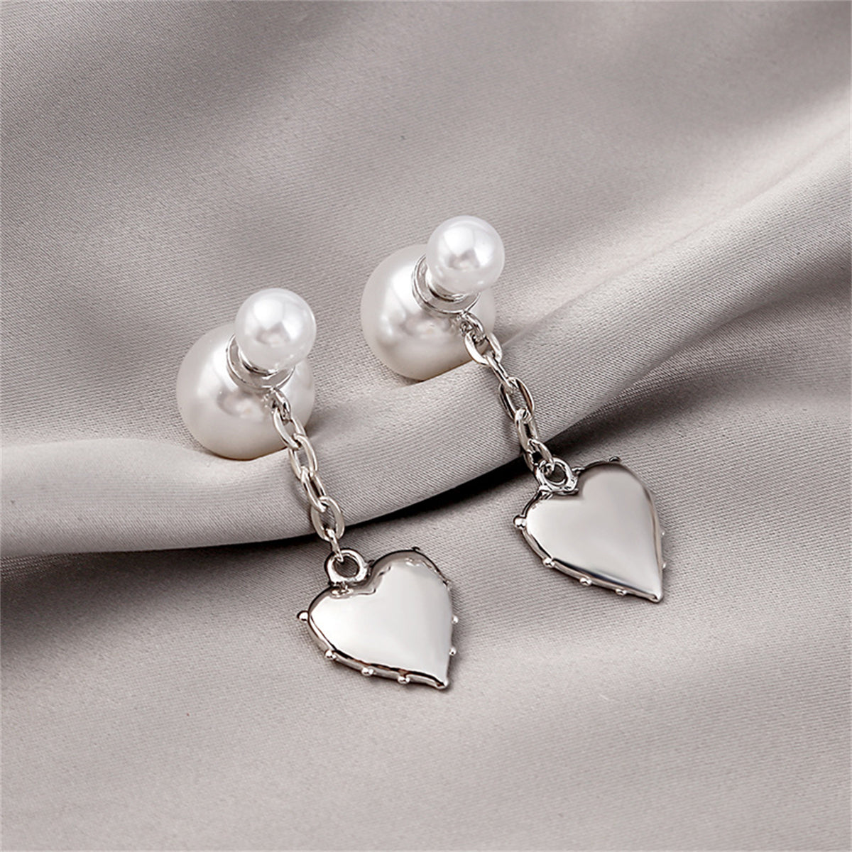 Pearl and Silver-Plated Heart Drop Ear Jackets, silver drop earrings for women, vintage-inspired design, front view