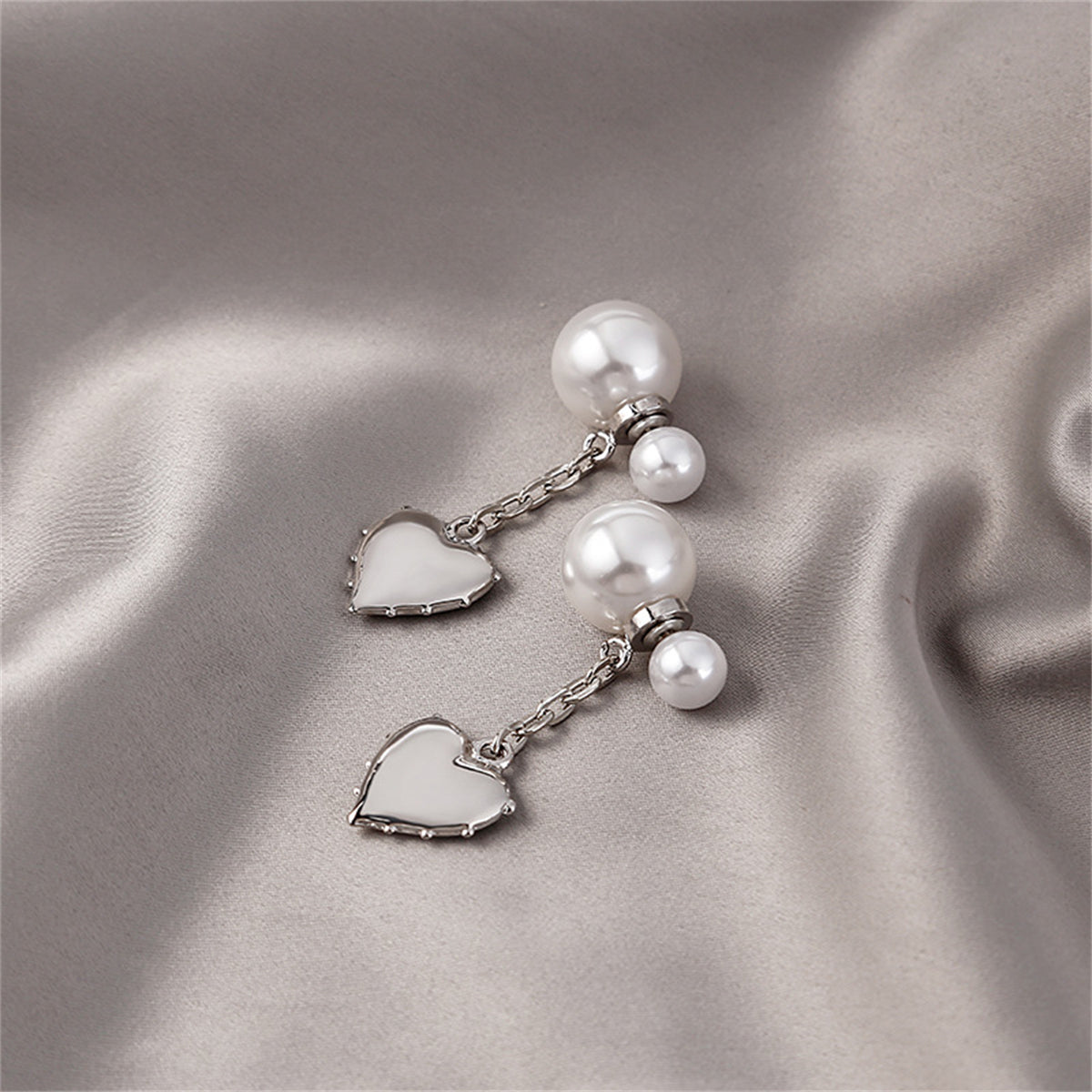 Pearl and Silver-Plated Heart Drop Ear Jackets, silver drop earrings for women, vintage-inspired design, side view